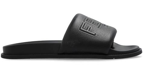 fendi roma leather slides.